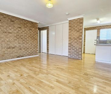 Comfortable Two-Bedroom Unit With A Courtyard - Photo 1