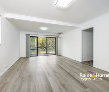 Renovated Upstairs Unit with Spacious Living - Photo 1