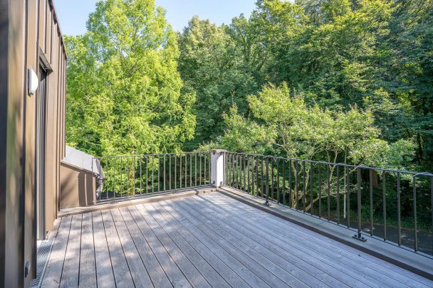 Exklusive Neubauwohnung mit atemberaubendem Fernblick und Balkonparadies! - Foto 1