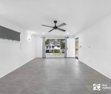 THREE BEDROOM FAMILY HOME IN BIRKDALE WITH A LARGE FULLY FENCED REA... - Photo 6