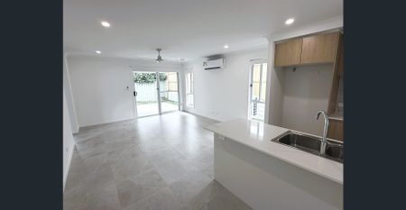 Spacious 4-Bedroom, 2-Bathroom House - Photo 2