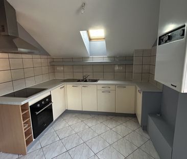 Location Appartement 2 pièces 42m² ST ETIENNE LES REMIREMONT 88200 - Photo 2