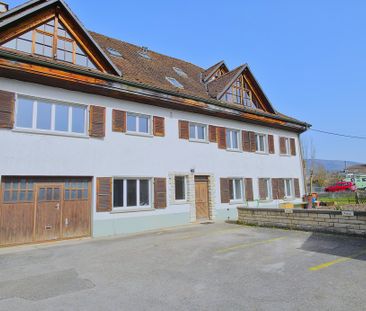 Rent a 4 ½ rooms apartment in Courchapoix - Photo 1