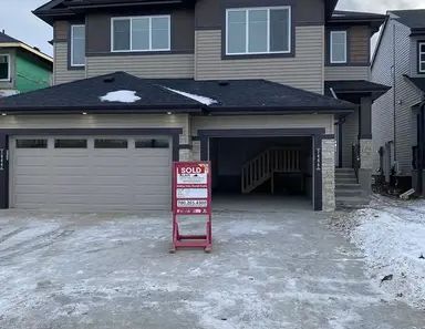 WONDERFUL 3 BEDS+BONUS ROOM ,2.5 BATH DUPLEX WITH GARAGE IN CHAPPELL | 7255 Chivers Place, Edmonton - Photo 1