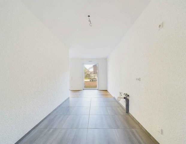 Neuwertige und modern ausgestattete Etagenwohnung mit Sonnenbalkon. - Photo 1