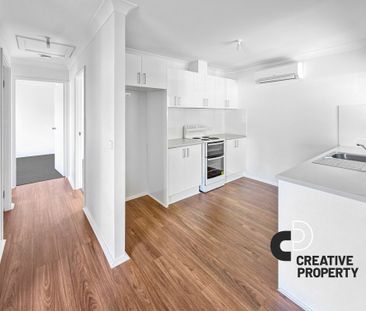 Renovated Two-Bedroom Flat Offering Comfort & Convenience - Photo 6