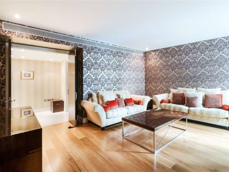 This is a wonderful "Garden Apartment" located in a landmark development in Knightsbridge. The development offers a 24 hour security team, concierge and residents pool and gym complex. - Photo 2
