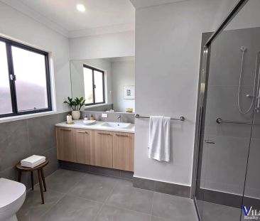 “Modern Family Living in New Estate with Solar” - Photo 5