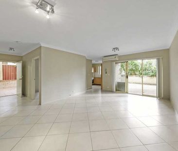 TWO BEDROOM VILLA STYLE UNIT WITH HUGE COURTYARD - Photo 1