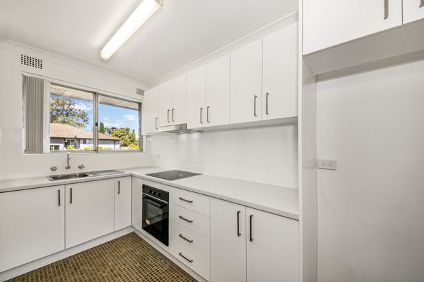 Air-Conditioned One Bedroom Unit with Built-in Wardrobe and Single Car Space! - Photo 1