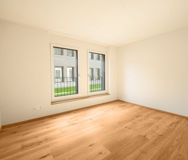 Gartenwohnung mit gedecktem Sitzplatz und Sonnenmarkise - Erstbezug - Foto 2