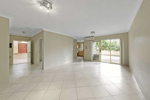 TWO BEDROOM VILLA STYLE UNIT WITH HUGE COURTYARD - Photo 1