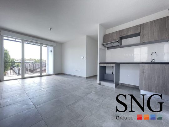 T3 AVEC BALCON ET UN PARKING COUVERT - Photo 1