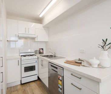 Elevated Bayside Living with Sweeping Water, City & Bridge Views - Photo 5