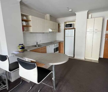 Cozy 1-Bedroom Studio with Covered Garage parking - Photo 5