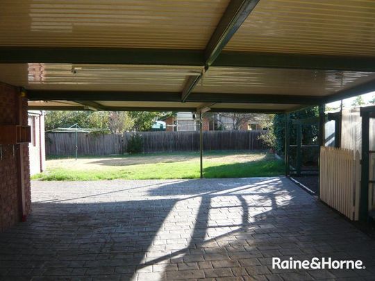 Generous Living, Great Location - Your Next Family Home - Photo 1