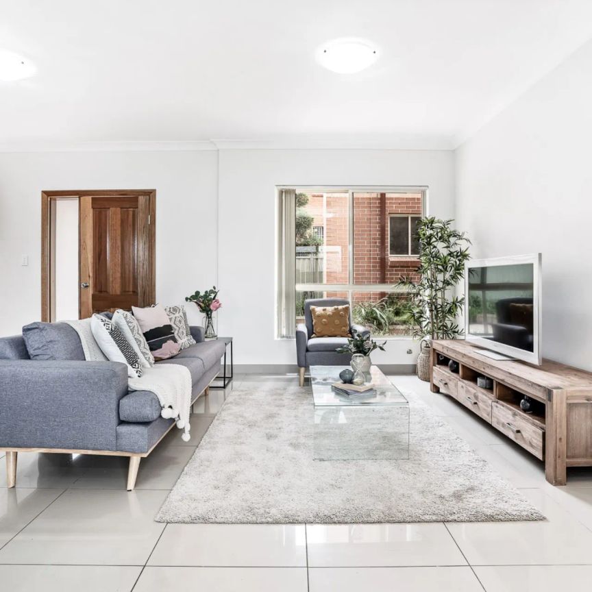 Spacious Tri-Level Townhouse in a Quiet, Convenient Setting - Photo 1