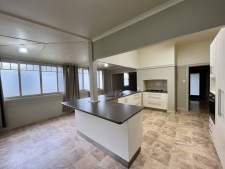 FAMILY HOME ACROSS FROM THE POOL! - Photo 2