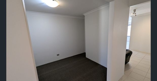 Freshly painted home with new carpet and landscaped gardens - Photo 1