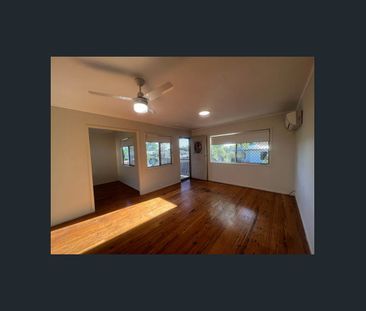 Updated Home with A/C + Fully Fenced Yard - Photo 1