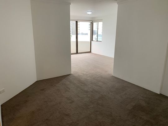 TOP FLOOR REFRESHED 2 BEDROOM APARTMENT WITH PARKING - Photo 1