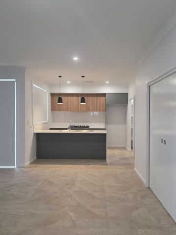 Brand New 4-Bedroom Home in Family-Friendly Estate – Crangan Bay - Photo 4