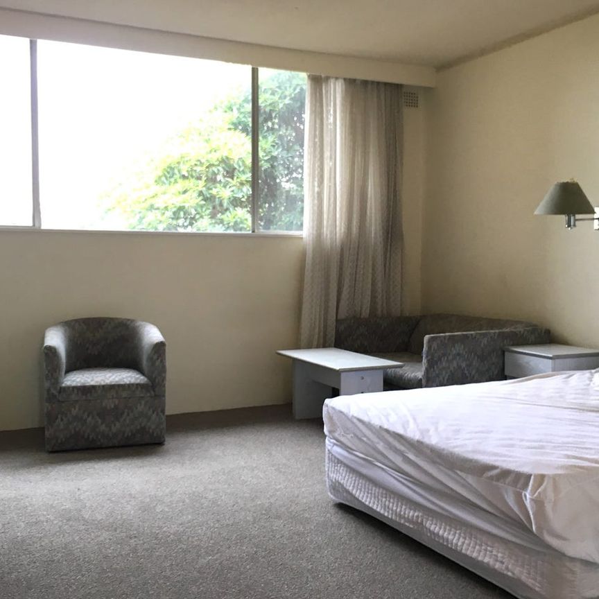 Superbly Located Studio with Parking - Photo 1