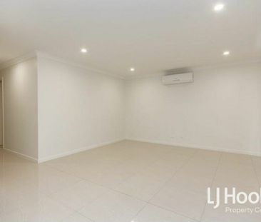 Modern Family Home with Stylish Finishes & Low-Maintenance Living - Photo 5