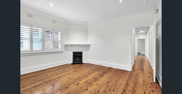 RENOVATED SEMI IN PRIME LOCATION - Photo 1