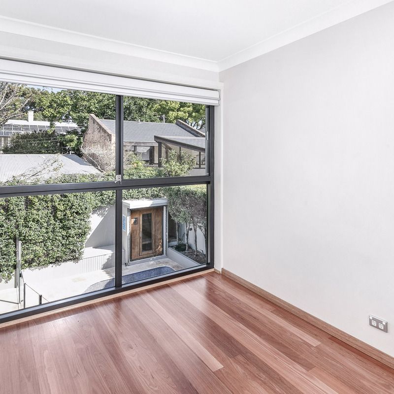 Contemporary Low-Maintenance Home with Pool in Premier Location - Photo 1