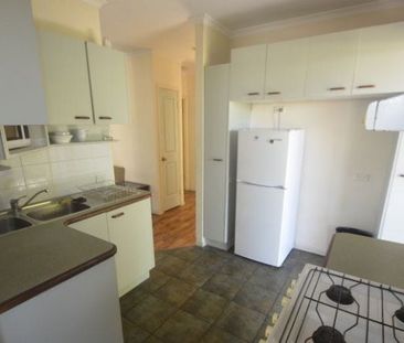 CENTERALLY LOCATED 2 BEDROOM HOME - READY TO MOVE IN! - Photo 6