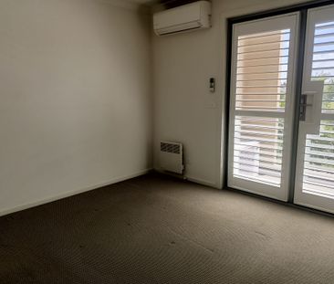Stylish Park-Facing Townhouse Offering Comfort & Convenience! - Photo 3