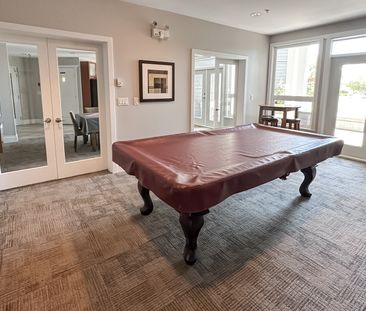 2 Bed + Den Condo | Steveston Village | Pond View • Parking - Photo 6