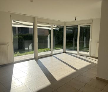 Bel appartement de 3 pièces au rez-de-chaussée avec terrasse et jardin - Photo 2