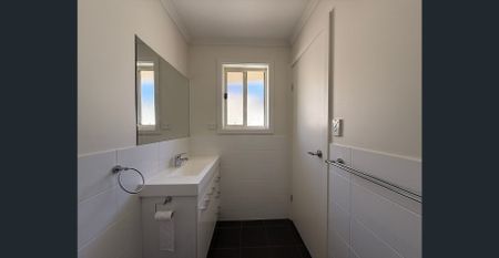 Modern 3-Bedroom Home with Open Living and Private Backyard - Photo 2