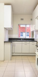 CENTRALLY LOCATED TWO-BEDROOM APARTMENT - Photo 3