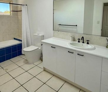 Modern 3-Bedroom Townhouse with New Kitchen & Floors + Big Yard - Photo 6