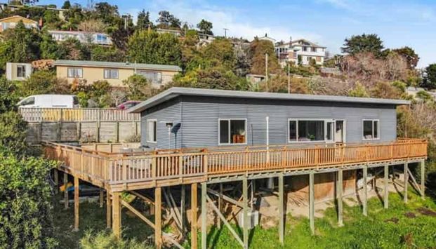 Modern, Sunny 4-Bedroom Home with Stunning Views! - Photo 1