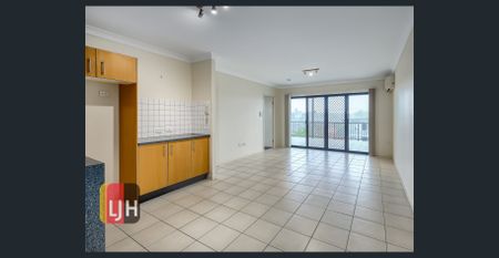 TOP FLOOR THREE BEDROOM UNIT WITH DOUBLE GARAGE & LARGE DECK! - Photo 5