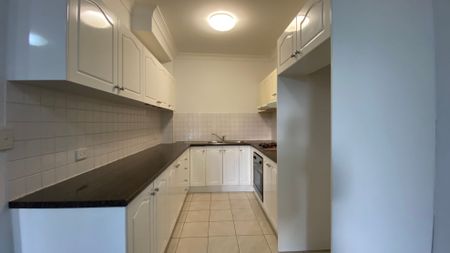 Freshly Painted Unit with As New Carpet and Lock-up Garage In Walk-to Everything Location - Photo 3