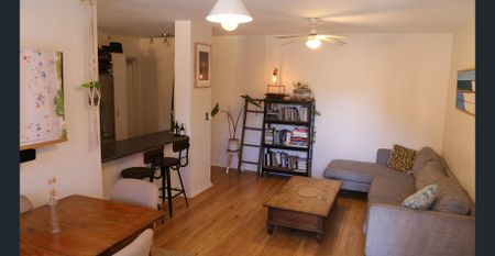 North-facing, Sun-Drenched, Renovated in Convenient Location - Photo 2