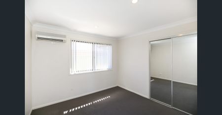 MODERN 4 BEDROOM, 2 BATHROOM HOME WITH MEDIA ROOM & DOUBLE BAY SHED! SOLAR PANELS + GAS HOT WATER! - Photo 5