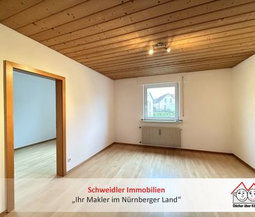 Zentral gelegene 2,5-Zimmer-Wohnung mit Einbauküche & Balkon in Röt... - Foto 1