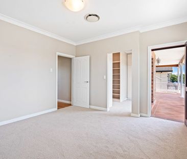 Spacious Family Home with Multiple Living Areas - Photo 5