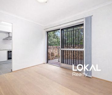 Full Brick Corner Townhouse in Prime & Convenient Location - Photo 1