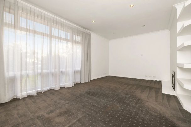 UNFURNISHED - Charming Solid-brick Home with Treetop Views - Photo 1