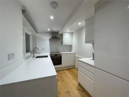 2 bedroom first floor maisonette with private patio and parking, on the High Street. - Photo 3