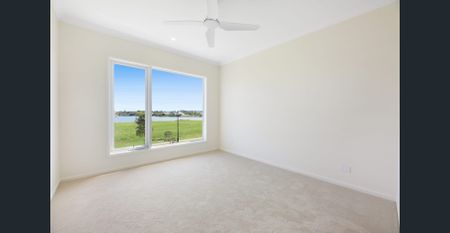 Brand New Waterside Luxury in the Exclusive Serenity Waters Estate - Photo 4