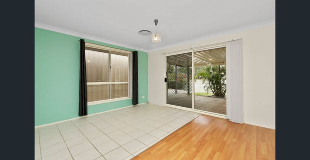 Spacious Family Home with Versatile Living and Excellent Amenities - Photo 1