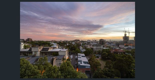 Inner-City Sub-Penthouse with Sweeping District Views - Photo 1